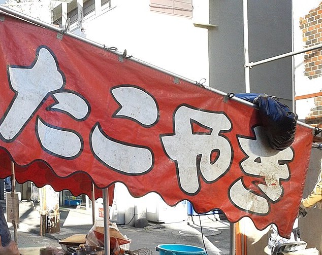 たこ焼き屋台の赤い幕