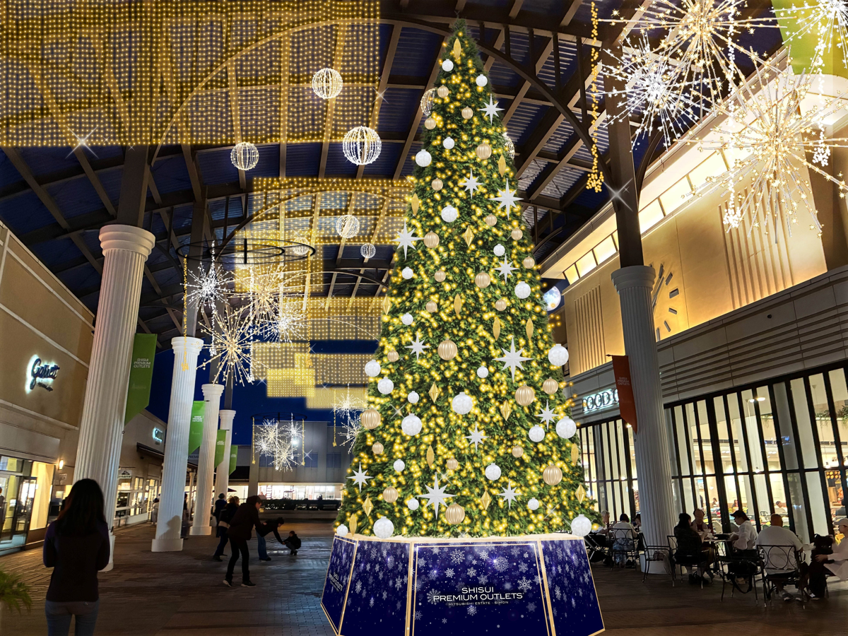 白い柱が並ぶ屋根付きの通路に、金色の電飾をまとった大きなクリスマスツリーと、天井から下がる星形の光の飾りを描いたイメージ図