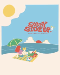 「SUNNY SIDE UP!」のロゴと、ビーチパラソルの下でレジャーシートに座りパンやワインを広げる人のイラスト