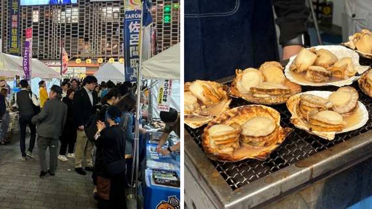 新橋SL広場の全国交流物産展のテントと、焼かれるホタテ
